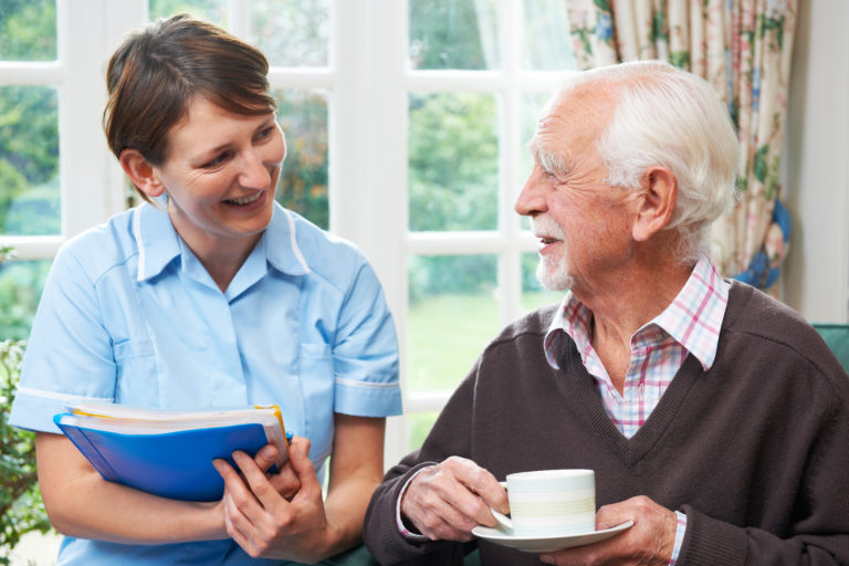 Senior man With domiciliary care At Home